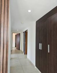 Spacious master bedroom with walk-in closet and balcony in PH Midrise Panama Pacifico