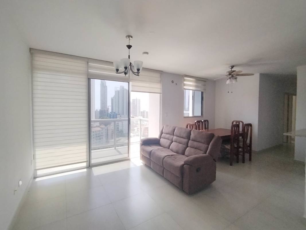 Bedroom featuring large corner window with blackout curtains in PH La Cresta Bella Vista Panama