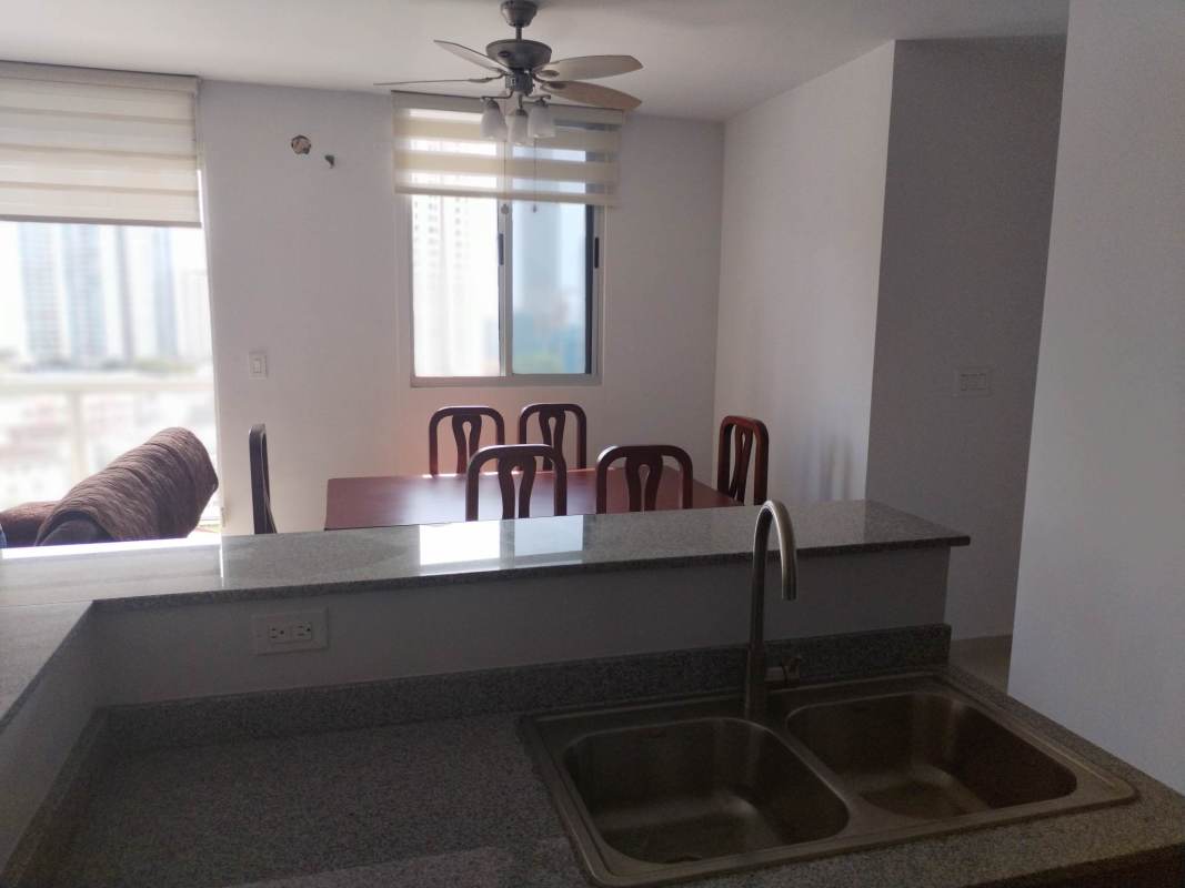 Open kitchen and dining area with granite counters PH La Cresta Bella Vista Panama