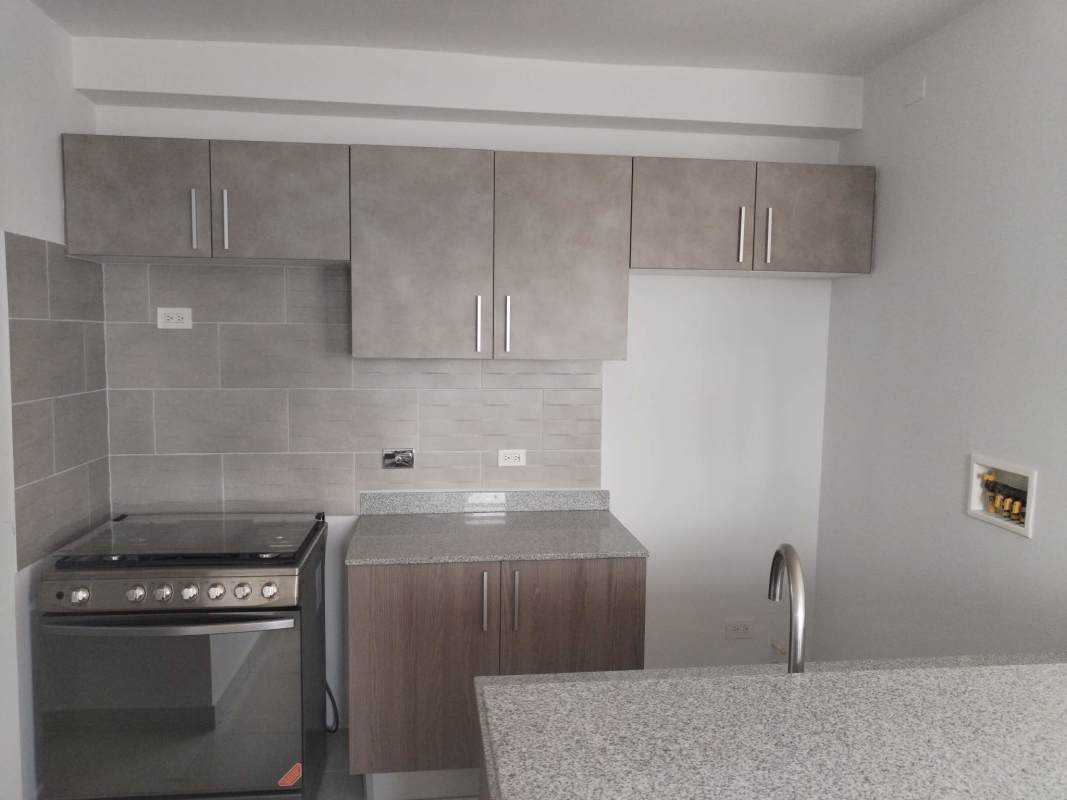 Bright living room with city skyline views in PH La Cresta Bella Vista Panama