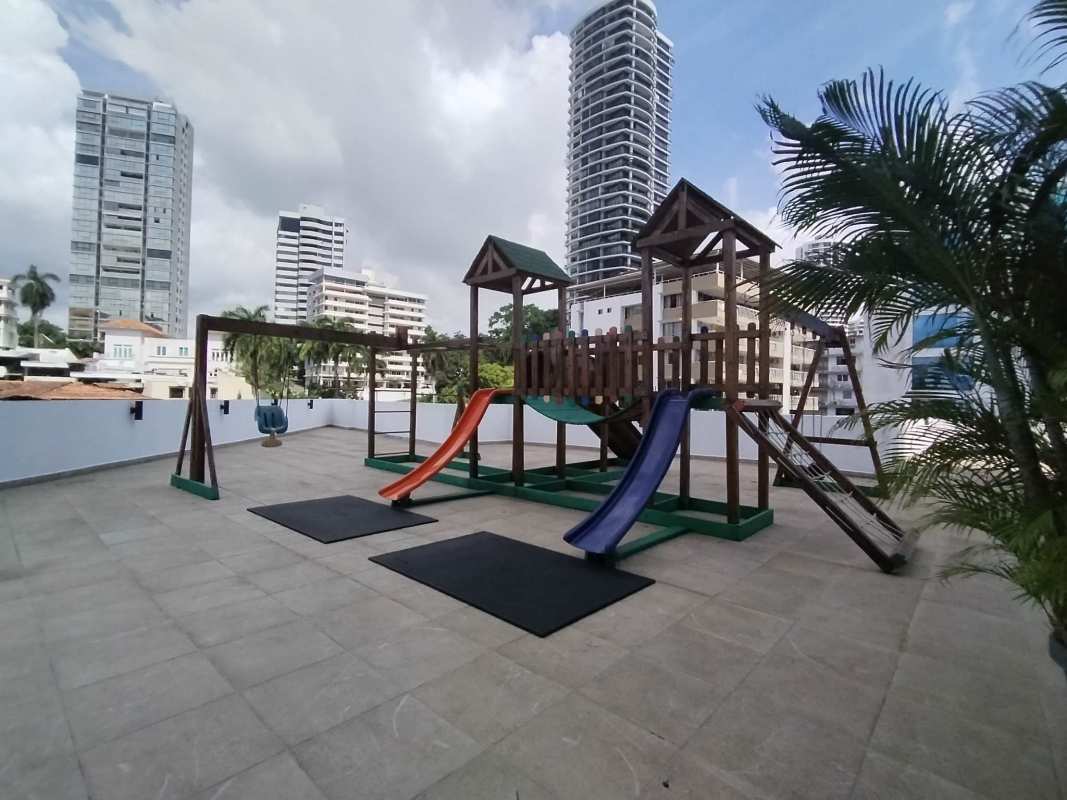 Rooftop terrace with kids playground and outdoor seating PH La Cresta Bella Vista Panama