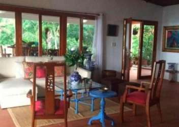 Covered terrace with dining set and ocean view at Playa Corona beach estate in Panama