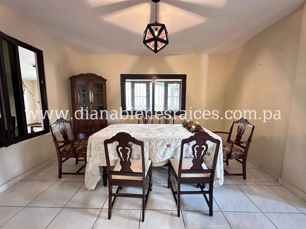 Bright living room with porcelain floor, AC, access to terrace in Clayton home for rent