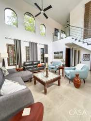 Kitchen with granite countertops, mosaic backsplash, stainless steel appliances in El Valle Panama