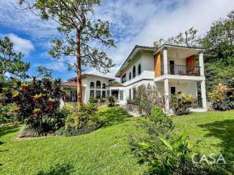 Landscaped garden with fruit trees mountain backdrop in El Valle Panama