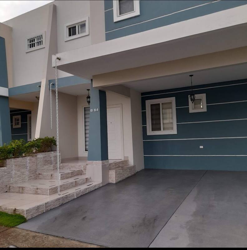 Contemporary two-story townhouse with beige porch, modern lighting in PH Alpes Brisas del Golf