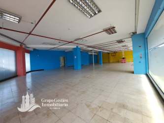 Retail showroom with glass walls, tiled flooring and multi-color columns in Plaza Costa Verde La Chorrera Panama