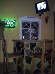 Covered terrace with rustic bar area and seating house for sale Chitré Panama