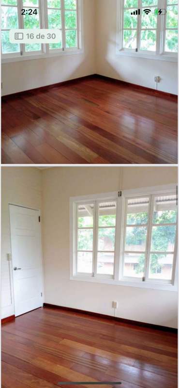 Bathroom with pedestal sink, bathtub, natural light window in Ancón duplex Panama
