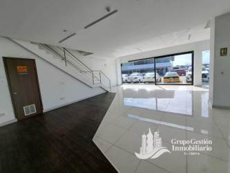 Modern commercial interior showroom with staircase glass door Costa Verde