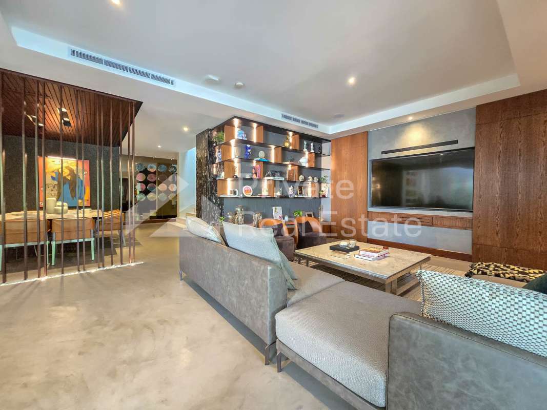 Contemporary dining area with marble table, wood accents staircase glass railing in PH Crescent Lane Santa Maria