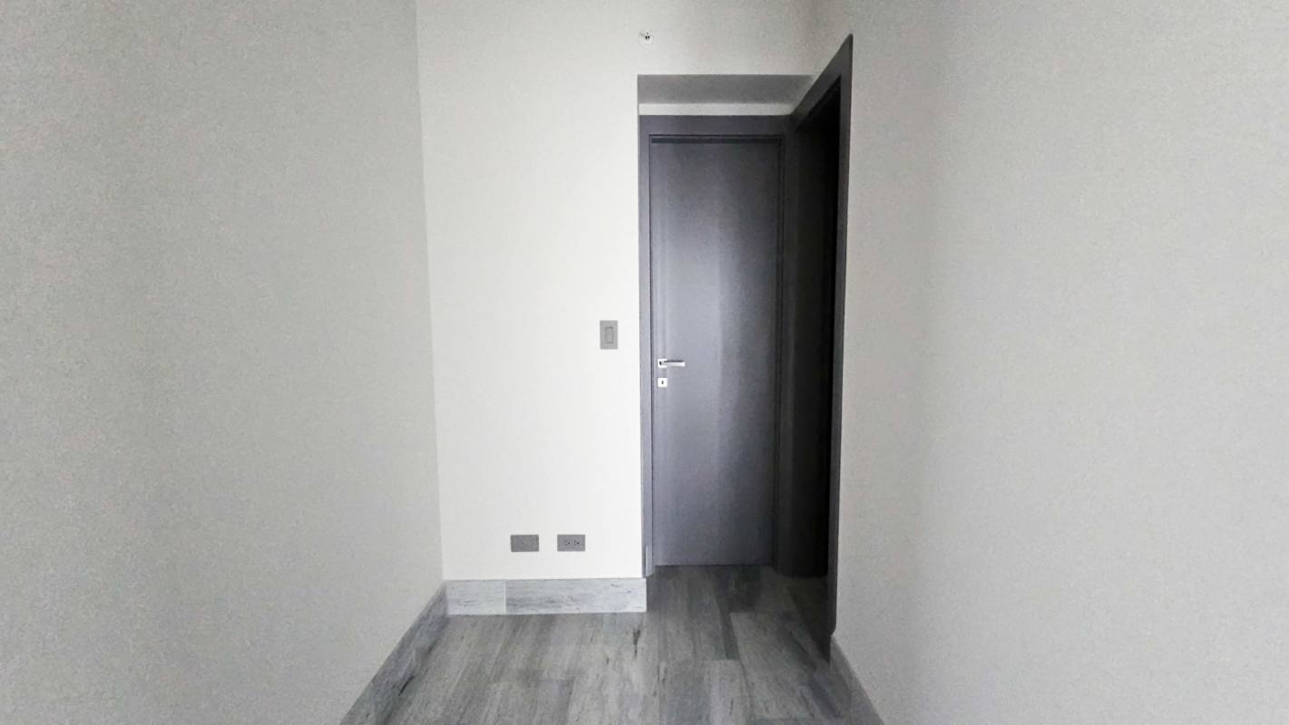 Skyline infinity pool overlooking ocean and cityscape on amenity deck at Nuovo by Armani Panama