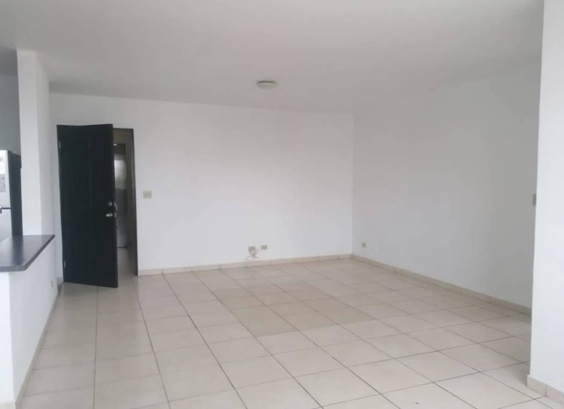 Spacious living area with modern kitchen open plan PH Altamira Carrasquilla Panama