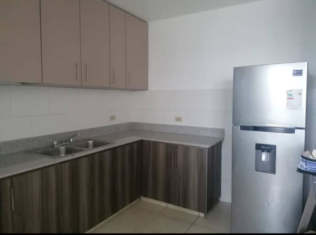 Kitchen featuring granite countertops fridge cabinets tiled floor PH Altamira Carrasquilla Panama