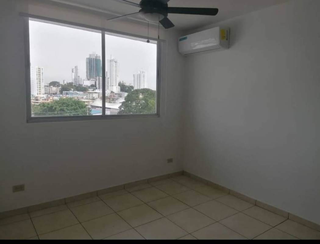 Large bedroom windows with skyline view roller blinds ceiling fan PH Altamira Carrasquilla Panama