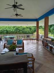 Traditional dining room vaulted ceiling chandelier large windows Coronado Panama