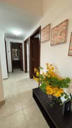 Modern bathroom with glass enclosed shower in Vista Mar condo