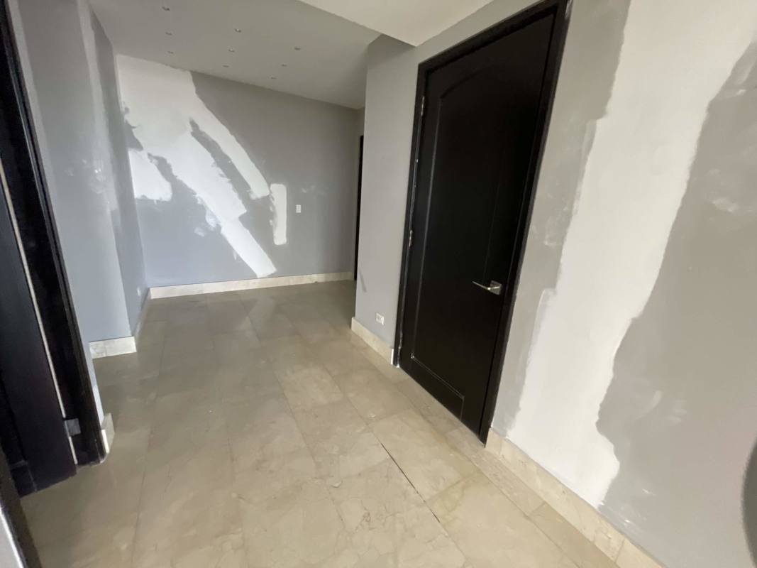 Spacious master bedroom with floor to ceiling windows, city and ocean view, marble floor, Punta Pacifica