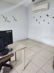 Private backyard garden patio area in family home Woodlands Panama Pacifico