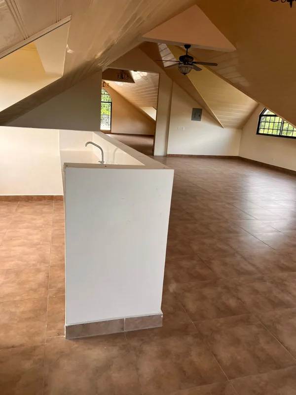 Colorful tiled enclosed terrace with panoramic windows in Panama City luxury house