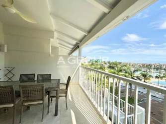 Spacious open living room ceiling fan dining Marina Village Buenaventura Panama condo