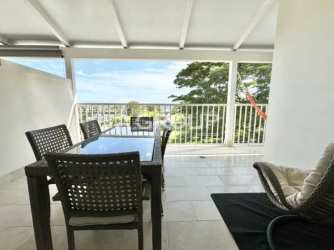 Large terrace with hammock overlooking gardens ocean Marina Village Buenaventura