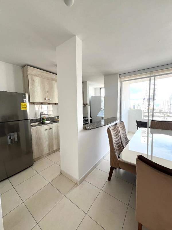 Modern open kitchen with granite counters and dining area, PH Montemar Obarrio Panama City