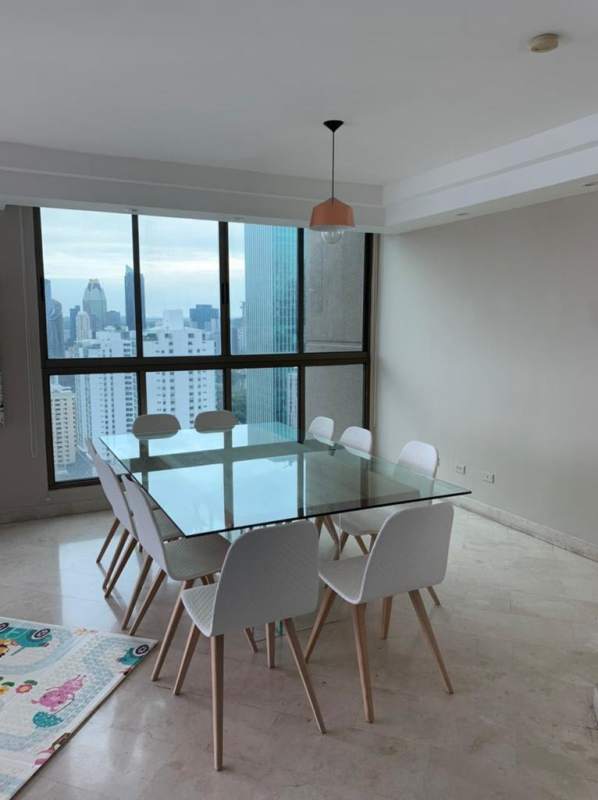Modern dining area with panoramic windows overlooking ocean PH Ocean Park Punta Pacifica Panama