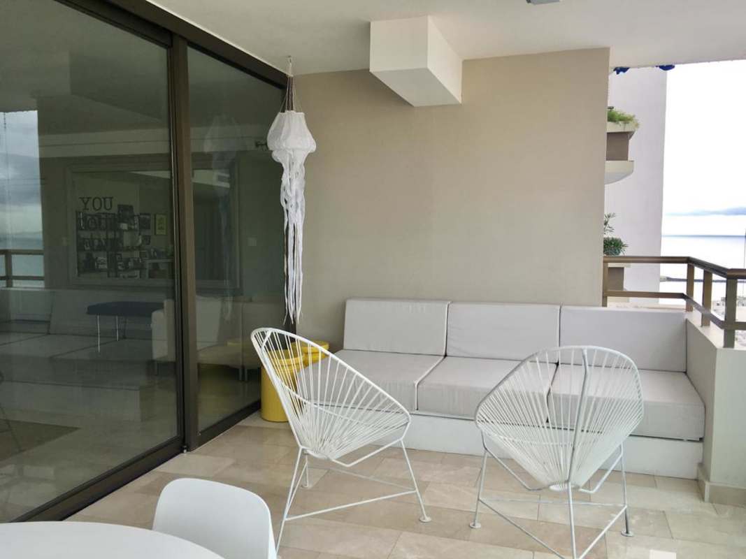 Modern Italian kitchen with premium appliances, granite counters and breakfast area PH Ocean Park Punta Pacifica Panama City