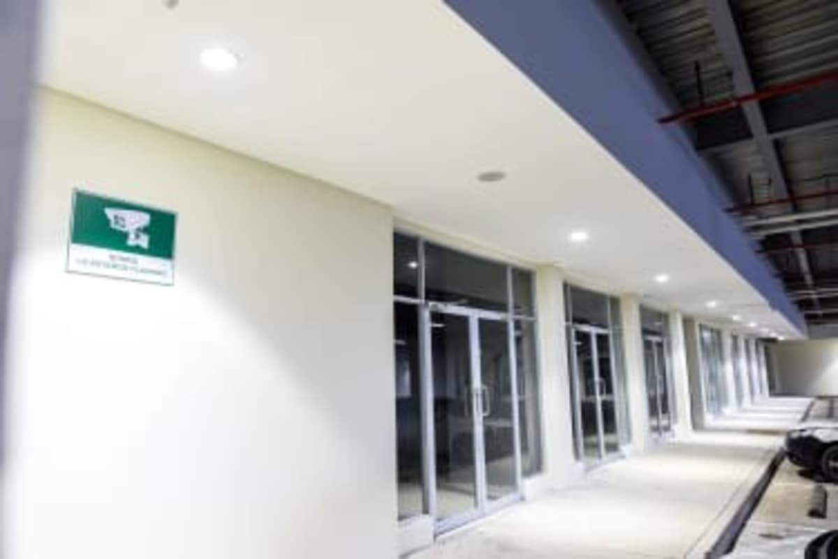 Panoramic view of Terranova Place Shopping plaza parking lot Pedregal Panama