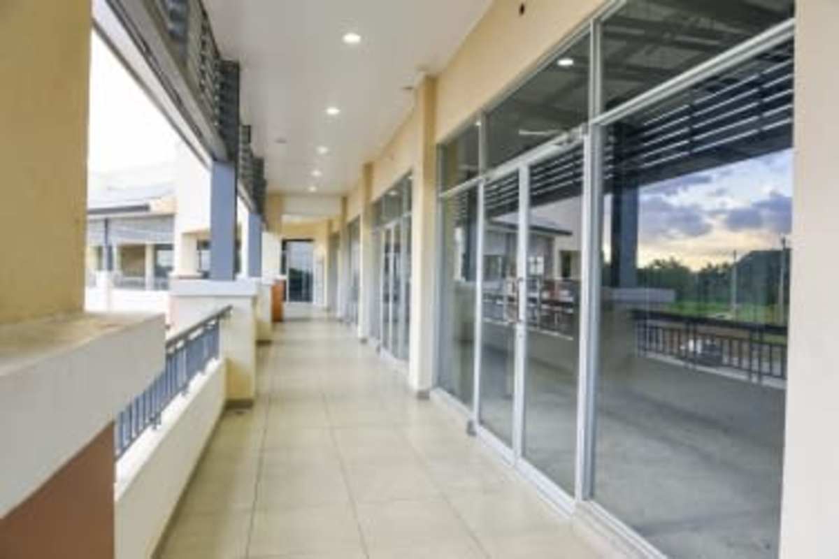 Glass facade shopping corridor ceramic floor Terranova Place Pedregal Panama