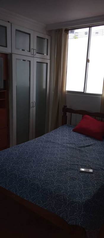 Bedroom with frosted wardrobe large window blue bedding PH Argentina Tower Chanis Panama