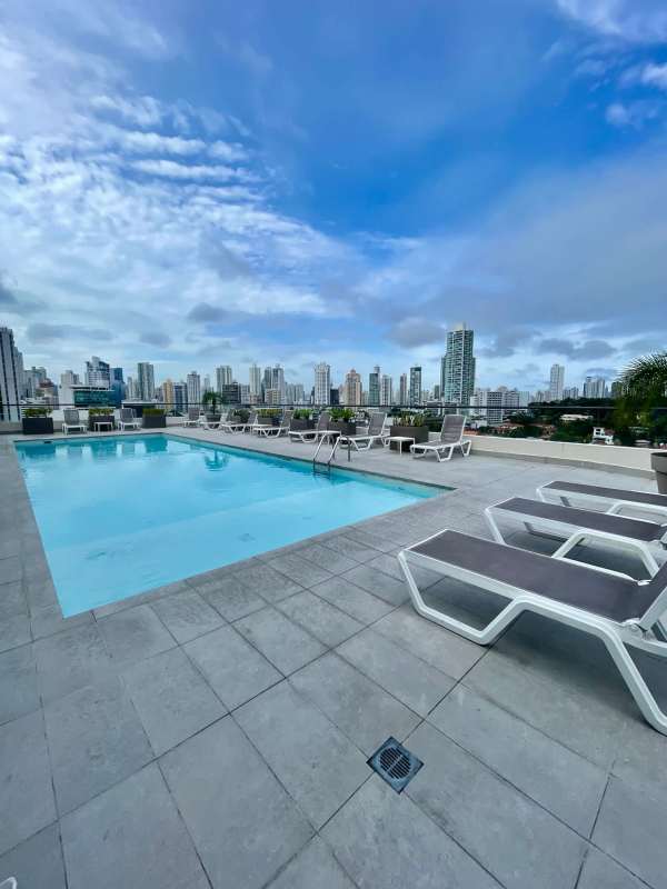 Bright master bedroom with walk-in closet and city views in PH Coco Place Coco del Mar rental apartment