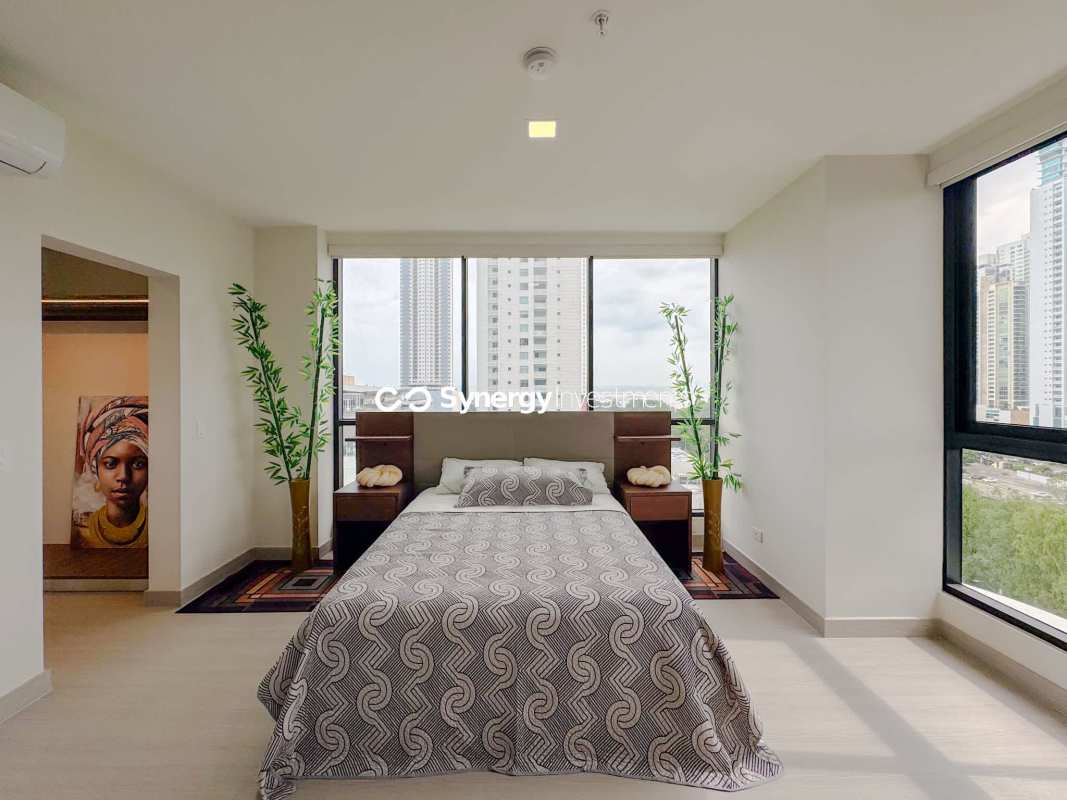 Balcony with stunning city skyline and partial ocean view at PH Costa del Este Residences luxury Panama condo