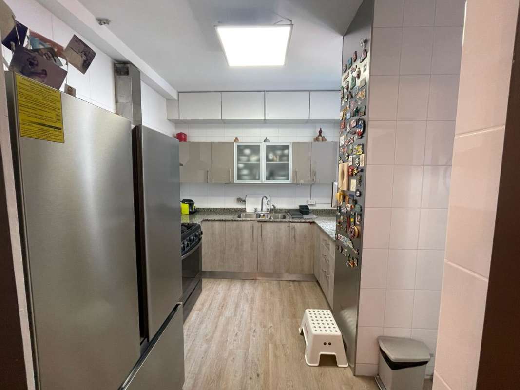 Contemporary kitchen with granite counters tile backsplash PH Torres de Toscana Panama