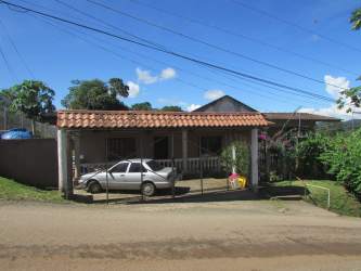 Single-family house facade tiled roof carport Burunga Panama
