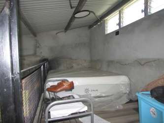 Industrial style interior of affordable house for sale in Arraiján Panama with exposed concrete