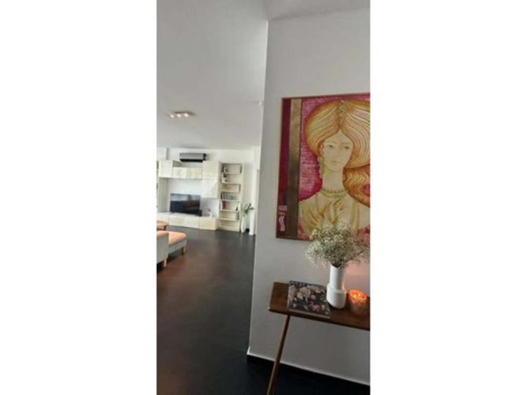 Master bedroom with built-in wardrobe and large window with ocean view in PH Marina Park Panama City