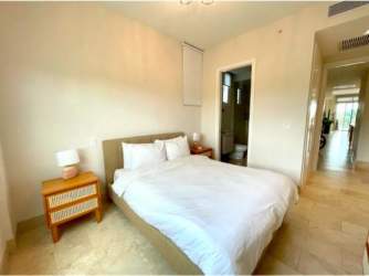 Open plan living dining with modern finishes opening to terrace PH Marina Village Buenaventura Panama