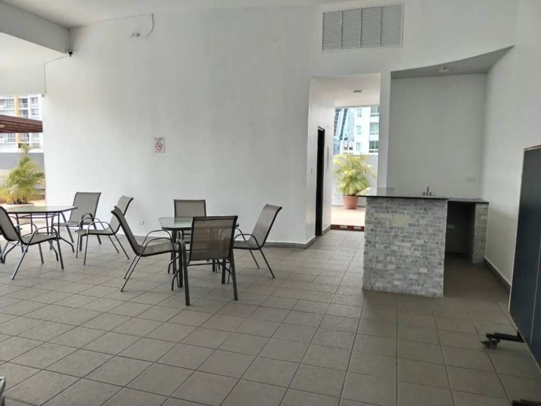 Kitchen with granite countertops, high-end appliances, wood cabinets in PH The Palace Obarrio Panama