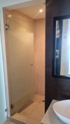 Bright open living dining area with access to balcony lagoon view Playa Blanca Panama