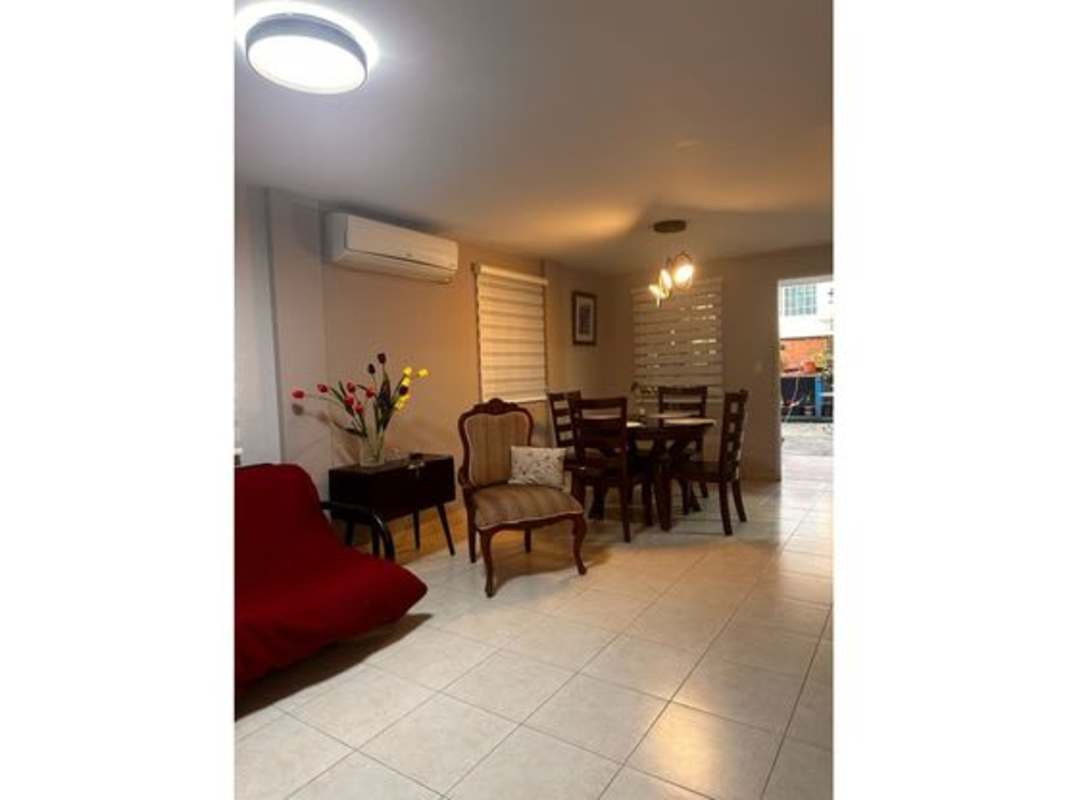 Comfortable bedroom featuring tile floors, bed, built-in closets, air conditioning, window blinds Dorado Lakes Panama