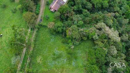 Aerial mixed pasture and forest on rural lot Cordillera Highlands Boquerón Panama