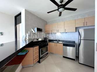 Furnished master bedroom with ocean views and ensuite bathroom Playa Blanca Panama