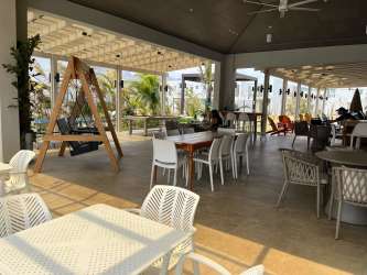 Shaded pergola and ping pong table outdoor recreation area at Playa Caracol Panama.