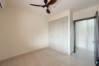 Bedroom with closet split AC porcelain tile rental Panama Pacifico River Valley