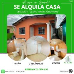 Simple bathroom with tiled walls, pedestal sink, shower and window in Penonomé