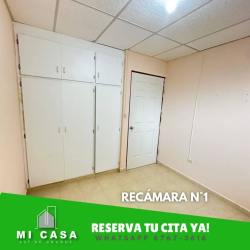 Empty bedroom with built-in closet, beige walls, tile floors Penonomé rental home