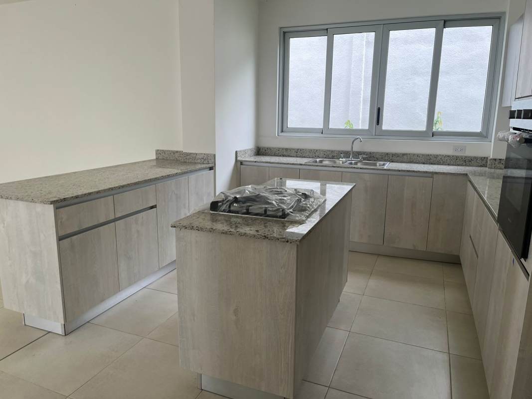 Granite countertop kitchen with stove and oven Villasur Costa Sur Panama house for sale