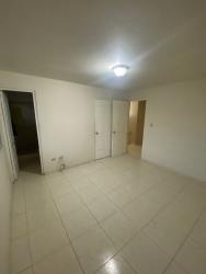 Master bedroom with ceramic tile floors and closet Los Cortijos Arraiján Panama